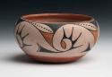 Pottery bowl. Incurved rim, buff with orange and black designs. 6.25" (rim dia