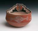 Pottery bowl. Flattened base, recurved upper portion, outer surface red with da