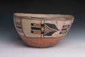 Large pottery bowl. Deep bowl with flat base, rim and shape uneven, red base, r