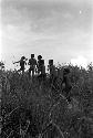 Boys walking up a hill