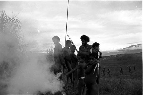 Men at a fire on the Warabara