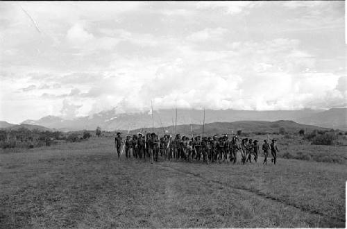 Men dancing Etai