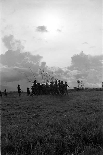 Men dancing Etai