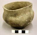 Complete ceramic bowl, slightly flared rim, plain
