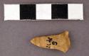 Chipped stone projectile point, corner-notched, stem missing