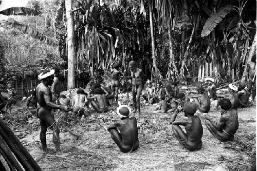 the haksé is being opened in the back sili; the sweet potatoes being brought out