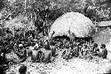 men sitting around after having eaten