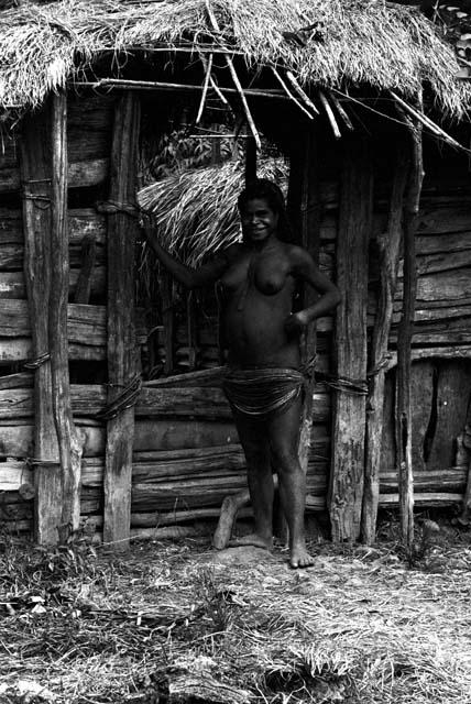 a woman stands in front of the sili at Abulupak