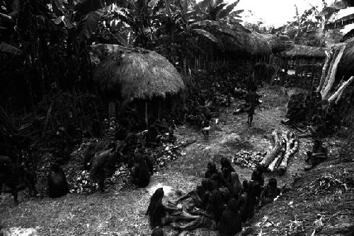 women around the hiperi that has just been cooked