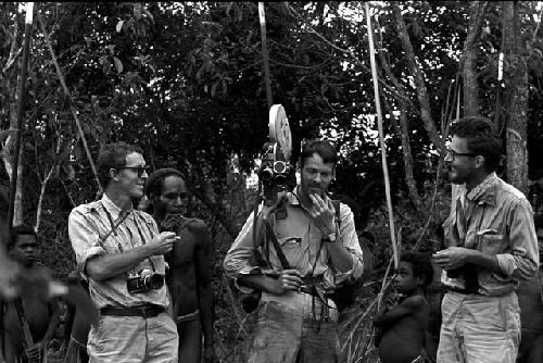 Peter Matthiessen, Ekali, Wali, Robert Gardner, and Karl Heider waiting