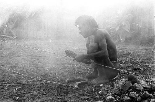 Wali prepares the hola ceremony - to help cure Yegé Asuk