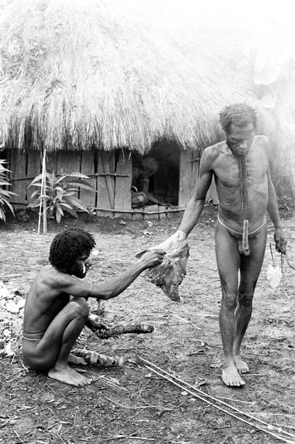 Wali prepares the hola ceremony - to help cure Yegé Asuk