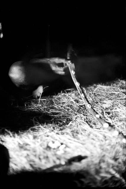 a man looking at a nyeraken aré