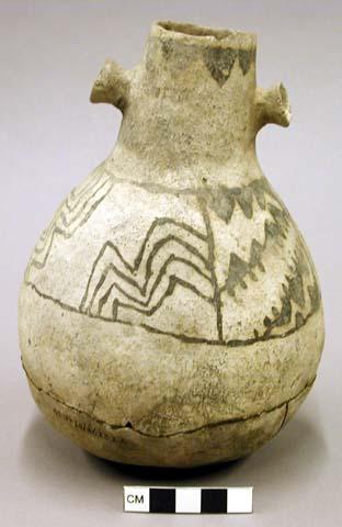 Black on white pottery bottle with two lugs