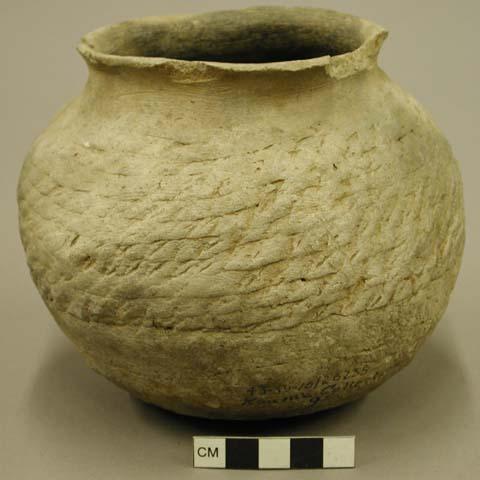 Corrugated pottery jar