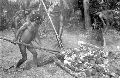 Taking hot rocks to make the haksé