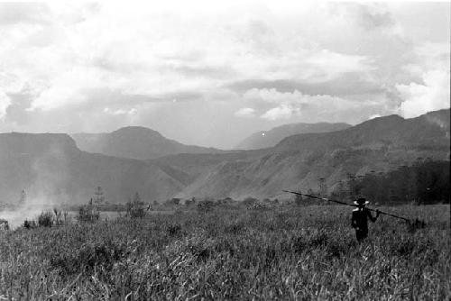 Man walking in field