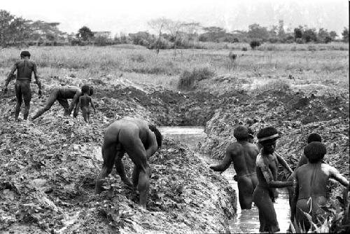 Men working in ditch