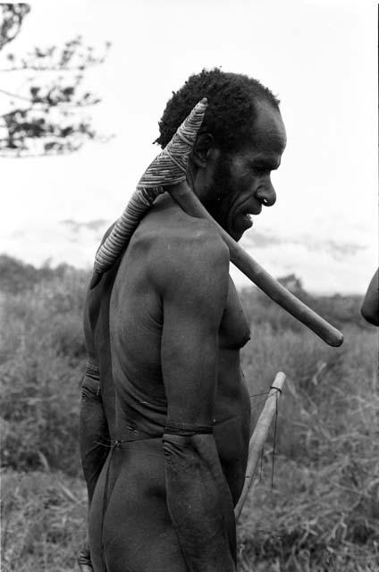 Abulupak man with stone axe