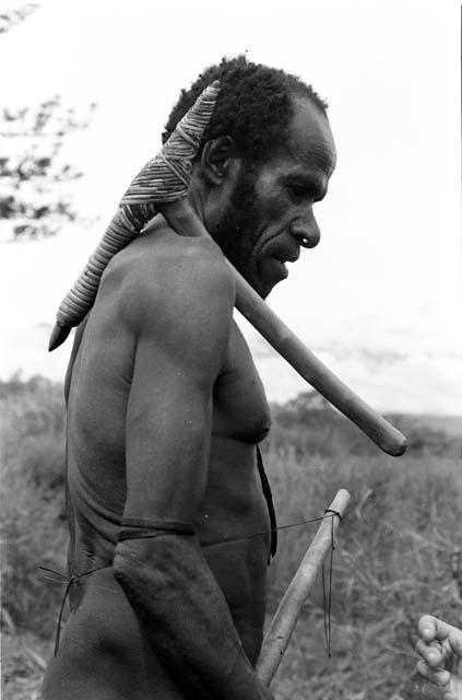 Abulupak man with stone axe