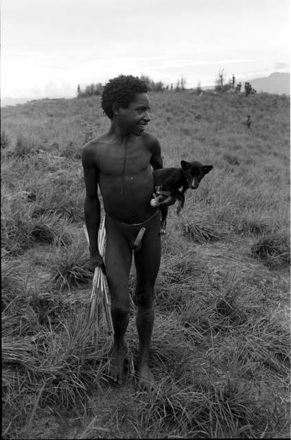 Young warrior with puppy