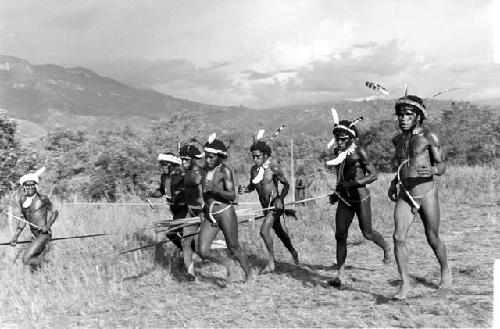 Boys and young warriors dancing