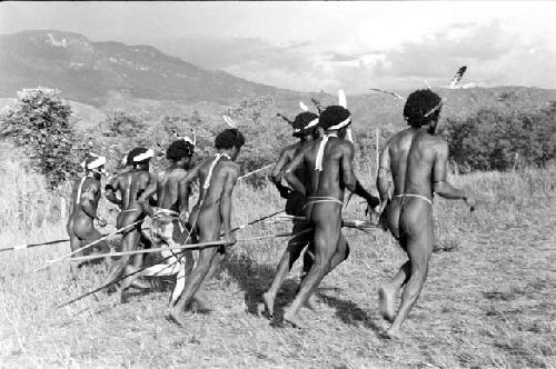 Boys and young warriors dancing