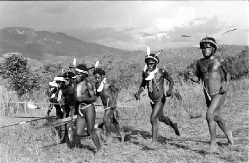 Boys and young warriors dancing