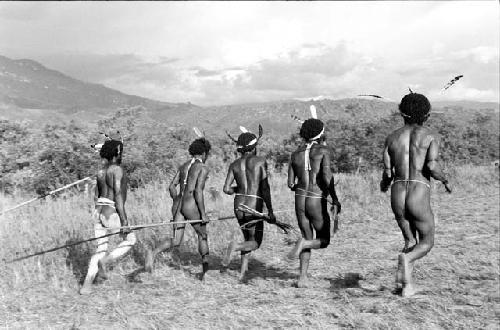 Boys and young warriors dancing