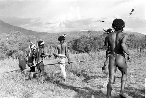 Boys and young warriors dancing