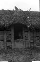 Woman in doorway of hunu