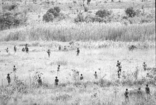 Men in field