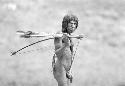 Man carrying bow and arrows