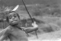 Boy throwing spear