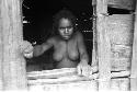 Woman in doorway of hunu