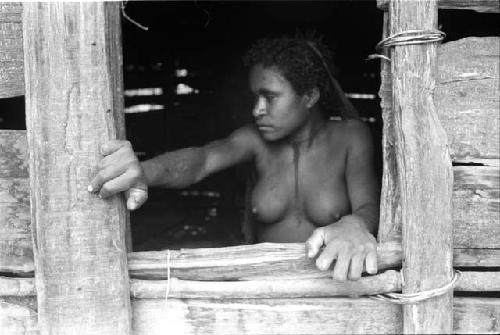 Woman in doorway of hunu