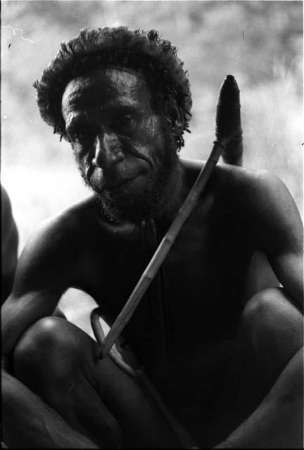 Man with a small stone axe