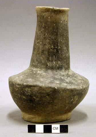 Ceramic vessel,long neck, flared rim, platform base