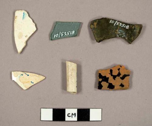 Earthern-ware sherds, some salt glazed; pipe stem fragments; sherds from bean po