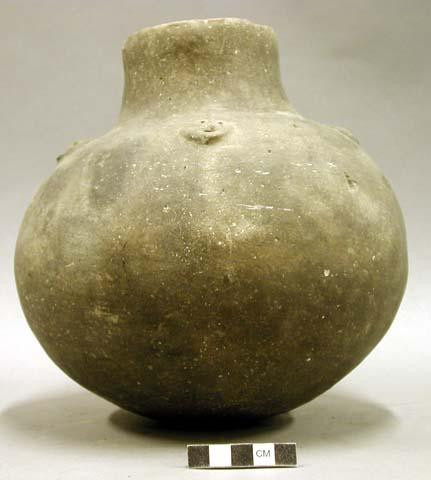 Ceramic complete vessel, short neck, four raised human faces