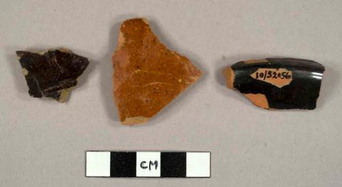 Body sherds, both sides glaze, dark and light brown.