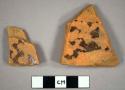 Body sherds. 0.375" thick. trace of lead glaze, one side.