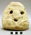 Ceramic "figurine", flared base, 5 holes, face-like.