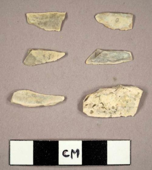 23 flint backed blades, bladelets, and fragments