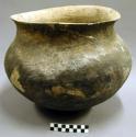 Pottery storage jar with incised decoration on neck