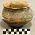 Restorable small san bernardino black-on-yellow pottery jar