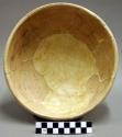 Ceramic complete vessel, bowl, brown-on-yellow interior and exterior, reconstruc