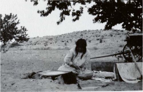 Woman making pottery