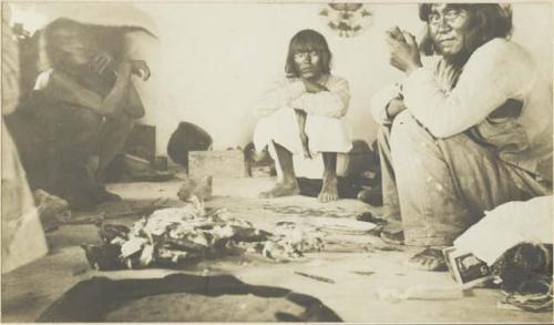 Hopi man making medicine