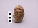 Ceramic effigy whistle, human figurine head, and animal figurine head.